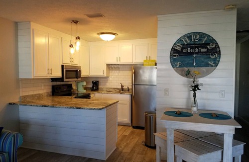 West Panama City Beach Condo | Beach access #73 across the street! Easy Parking! INQUIRE ABOUT SNOWBIRD RATES!