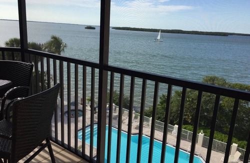 Punta Rassa Condo | Beachfront Stunning Corner Condo- Amazing Water views on Private Beach of Resort