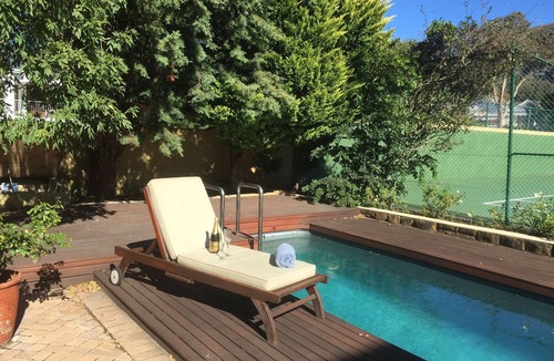 Fernkloof Villa | Botanists heaven. Rare plant species only in Fernkloof. Tennis court/lap pool.