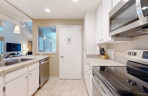 Tennis Village House | Comfortable condo with shared pool, SHARC passes, trails, and more!