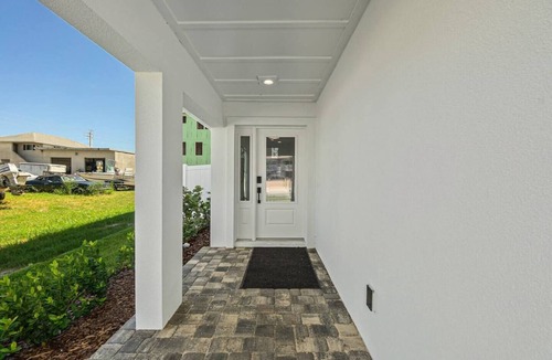 St. Augustine Beach Villa | Endless Summer Oasis heated pool and putting green