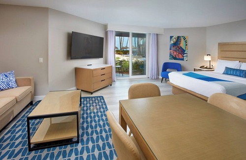 Palm Beach Hotel | Enjoy a Peaceful Stay with Great Amenities! Outdoor Pools, Beach, Free Parking!
