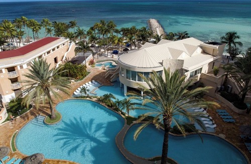 Palm Beach Hotel | Enjoy a Peaceful Stay with Great Amenities! Outdoor Pools, Beach, Free Parking!