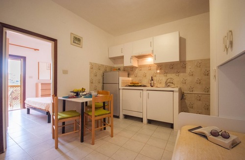 Capoliveri Resort | Residence La Valdana - 4 person apartment with swimming pool, tennis and parking 1km from the beach