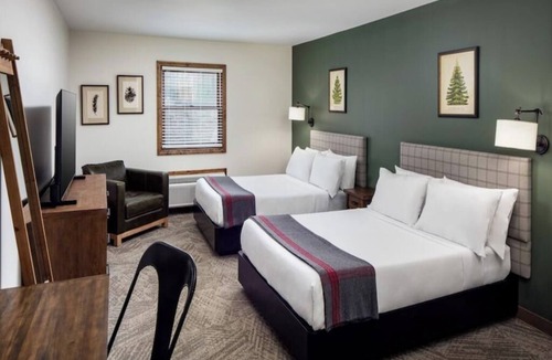 Schroon Lake Hotel | Rustic Lodge Retreat Located at Schroon Lake | Outdoor Fire Pit | Indoor Pool