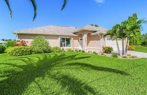 Trafalgar Villa | Sunset Villa 1035 Modern Waterfront Heated Pool Home w/Fire Pit
