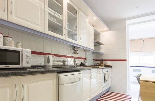 Sao Jorge de Arroios Apartment | Typical, family apartment with terrace for up to 8 people.