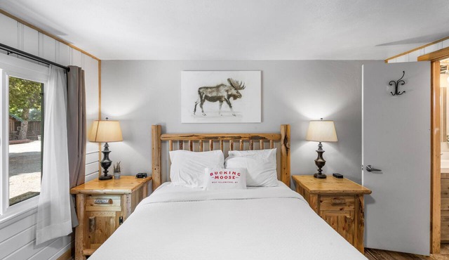 Cozy Bobcat Queen Room at The Bucking Moose, just 1 minute from Yellowstone in West Yellowstone. in West Yellowstone