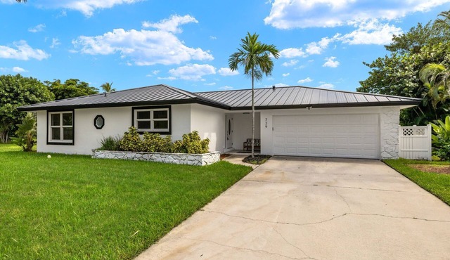 Exceptional canal front home, beautiful design, steps to beach!
