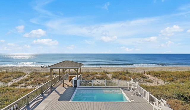 Oceanfront Serenity Sands in Oak Island, NC, boasts 8 bedrooms for 20 guests. in Oak Island