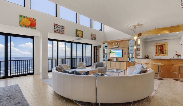Penthouse Oasis: 180° Water Views & Heated Pool