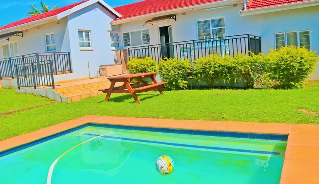 Spacious urban home with private pool in the backyard. 5 minutes from the beach.