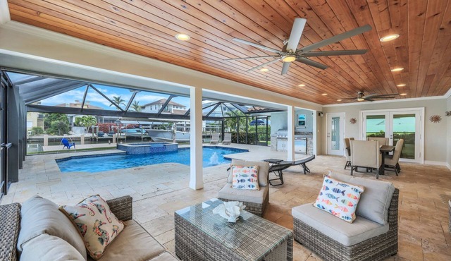 Sunsations | Waterfront Home with Private Dock | Saltwater Pool & Spa in Naples