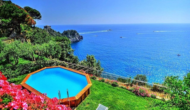 Villa Amaltea: A bright three-story villa built sheer above the sea, with Free WI-FI.