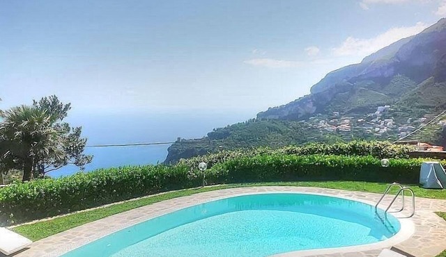 Villa Mabella: A bright and elegant three-story historical villa located on a hillside, facing the sea, with Free WI-FI.